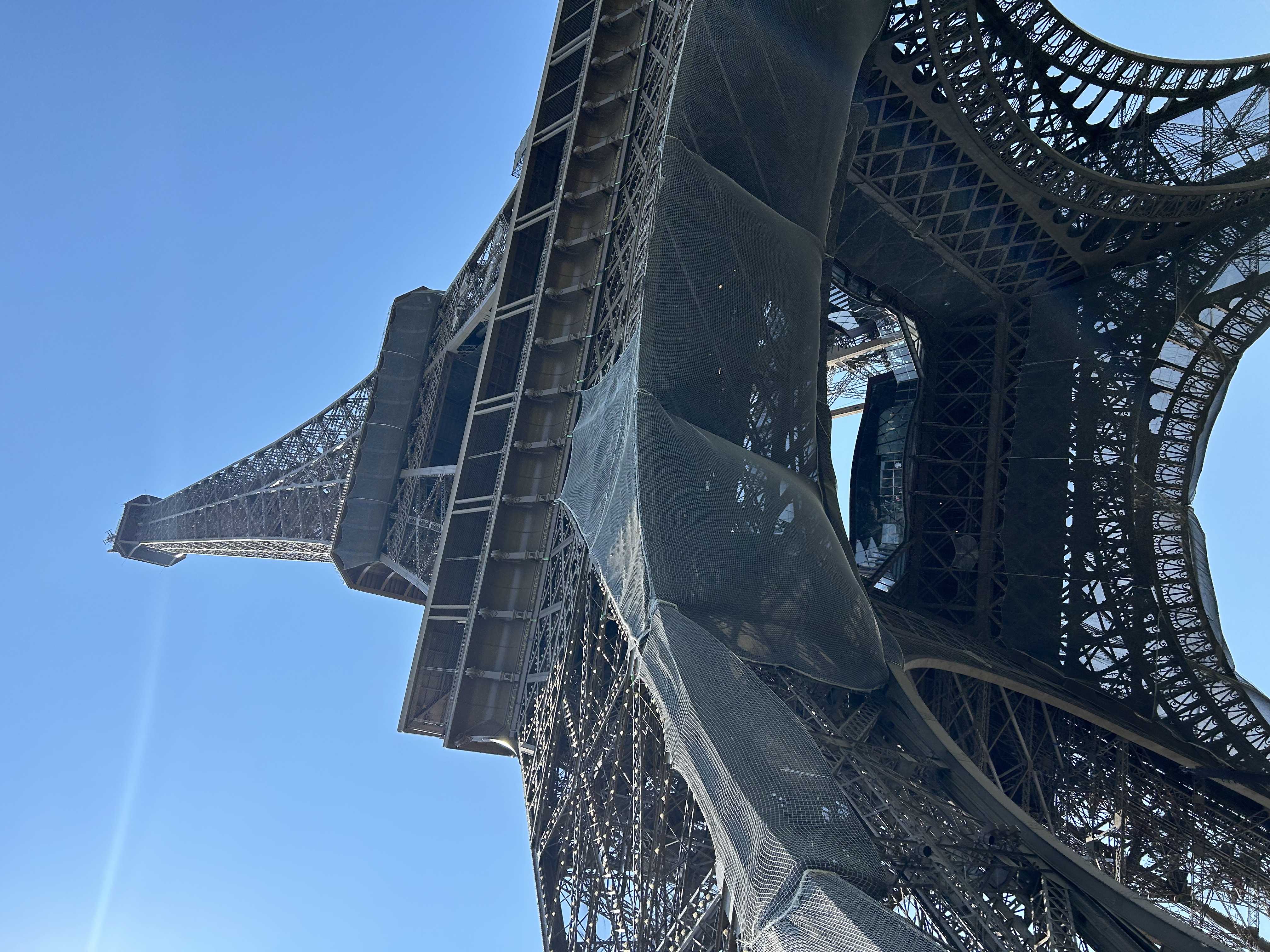 Photo of the Eiffel Tower from below.